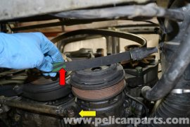 if you have not enough room to get rid of the belt you are able to disconnect the turnbuckle through the A/C mount (yellow arrow) and fall the belt off (purple arrow).