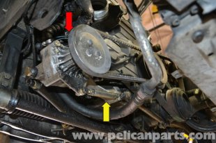 From the power steering pump start with loosening the 13mm bolt at the top of energy steering mount (red arrow, hidden behind the pulley).