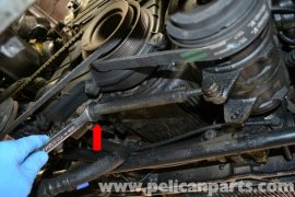 utilize two 17mm wrenches and separate the double peanuts for each end of turnbuckle (purple arrow).