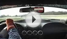 2 cobra r chasing down a porsche carrera gt