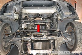 with all the car properly raised and supported remove the underneath engine tray (red arrow, tray removed).